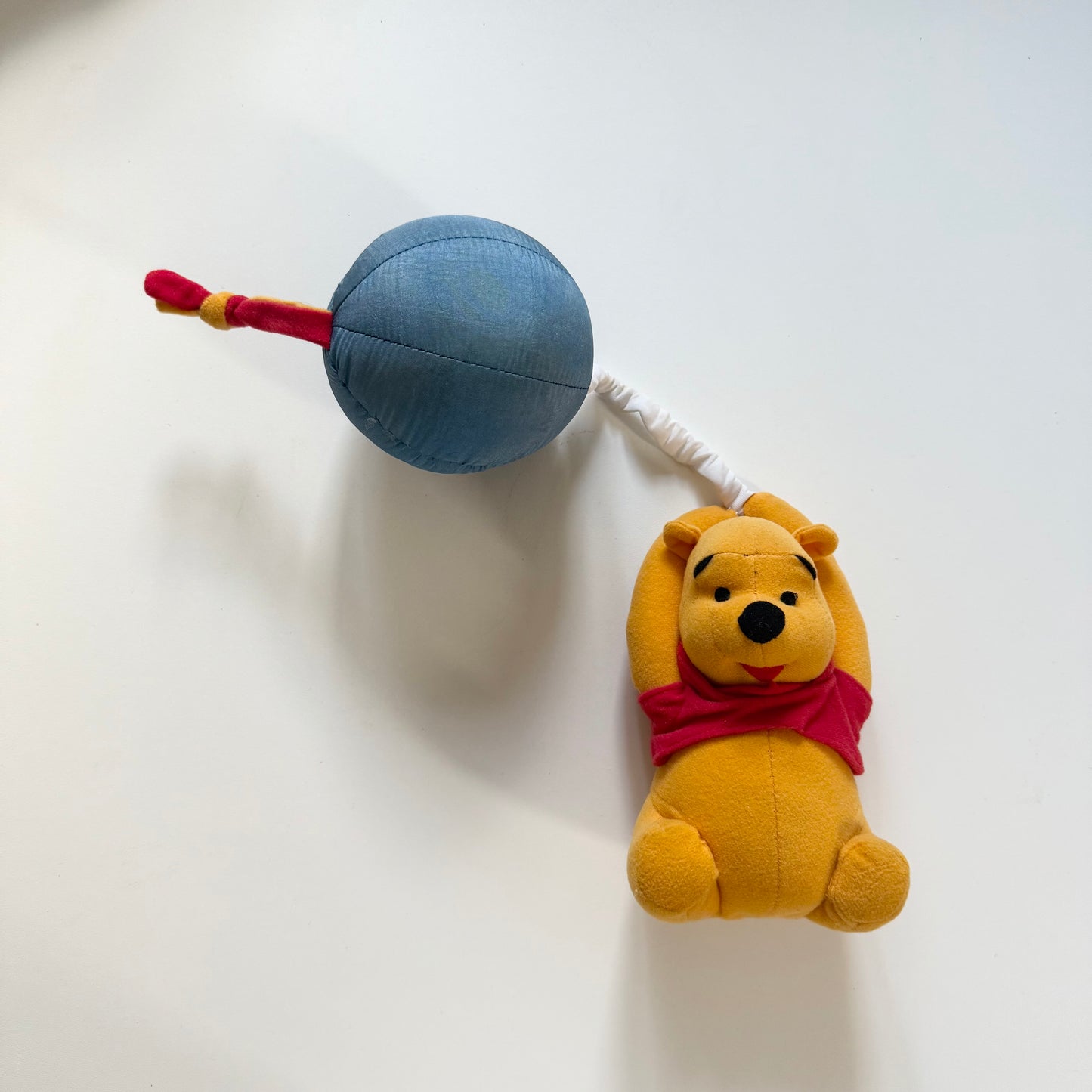 Vintage Winnie the Pooh musical toy. Can clip onto a pram or cot.
