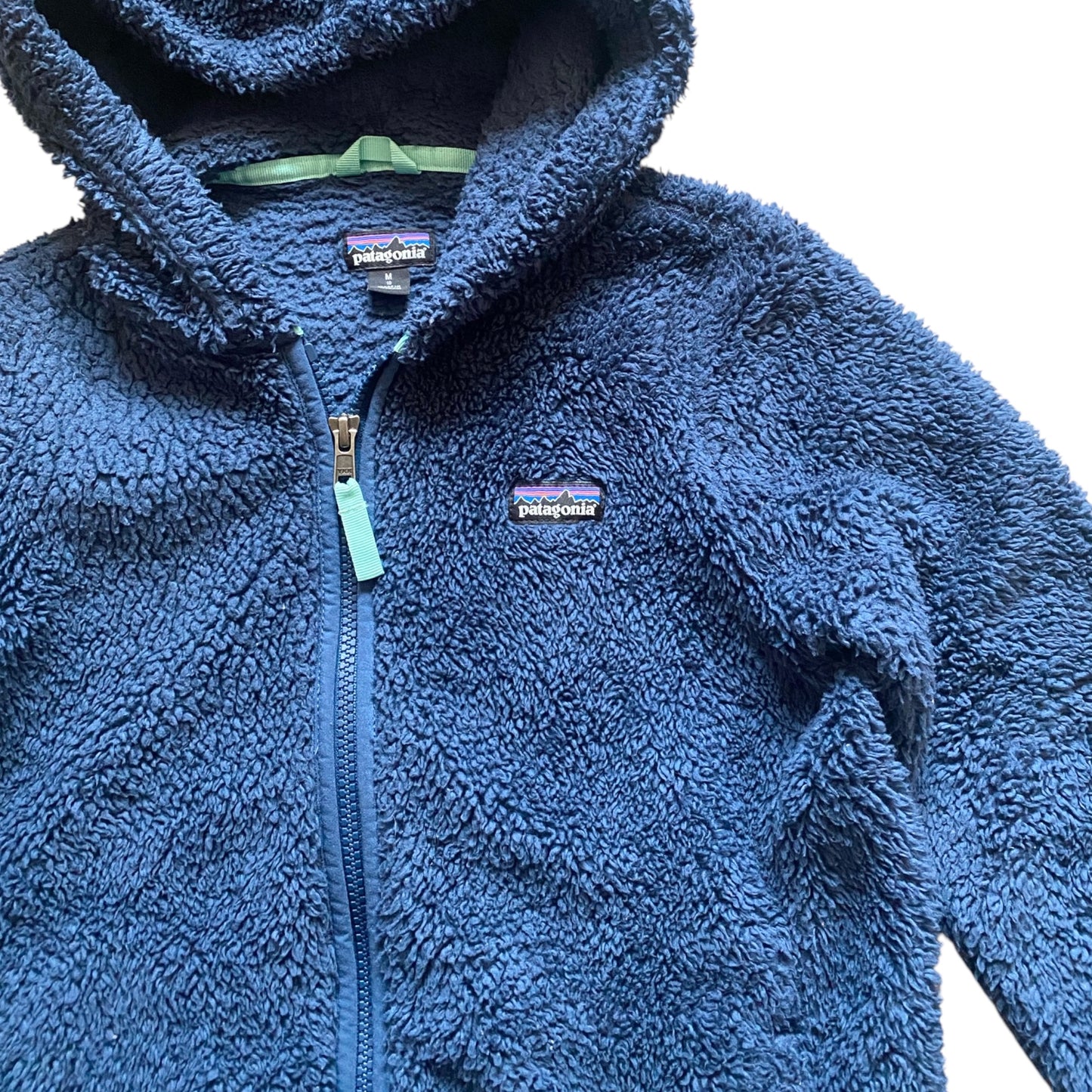 Patagonia navy blue fleece zip up jacket. Size 10 years