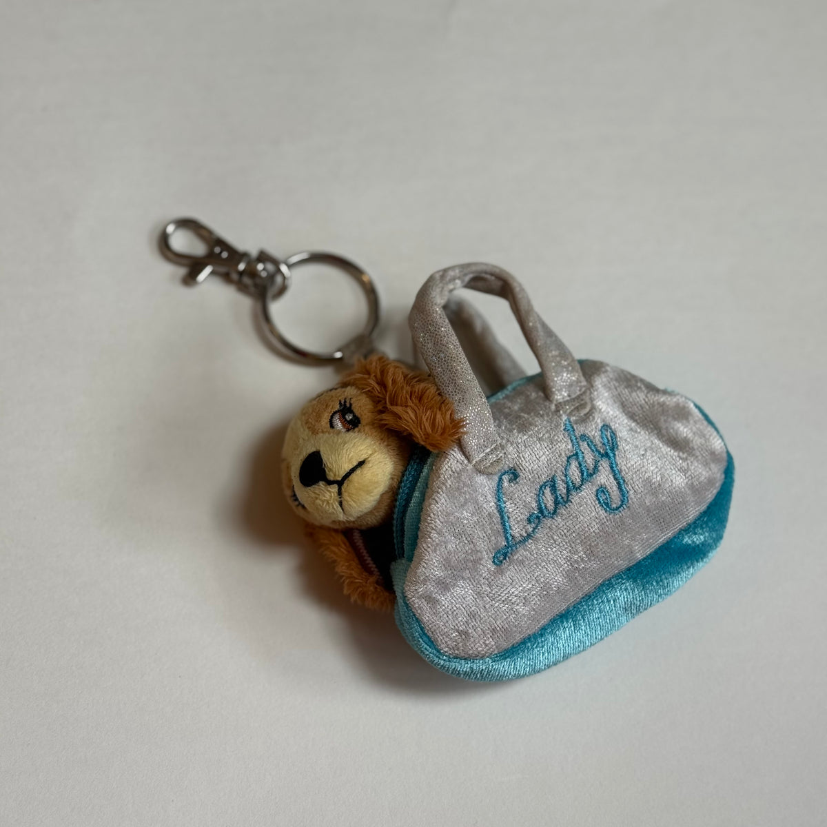 Vintage lady and tramp keyring.