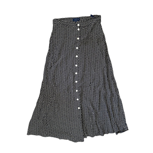 Mid length jigsaw navy blue & white spotty skirt. Size 6-8
