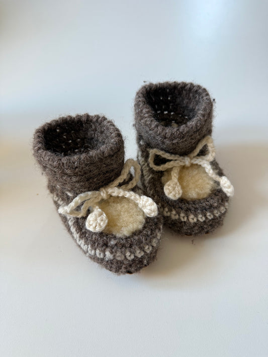Vintage sheepskin/ knitted baby boots.