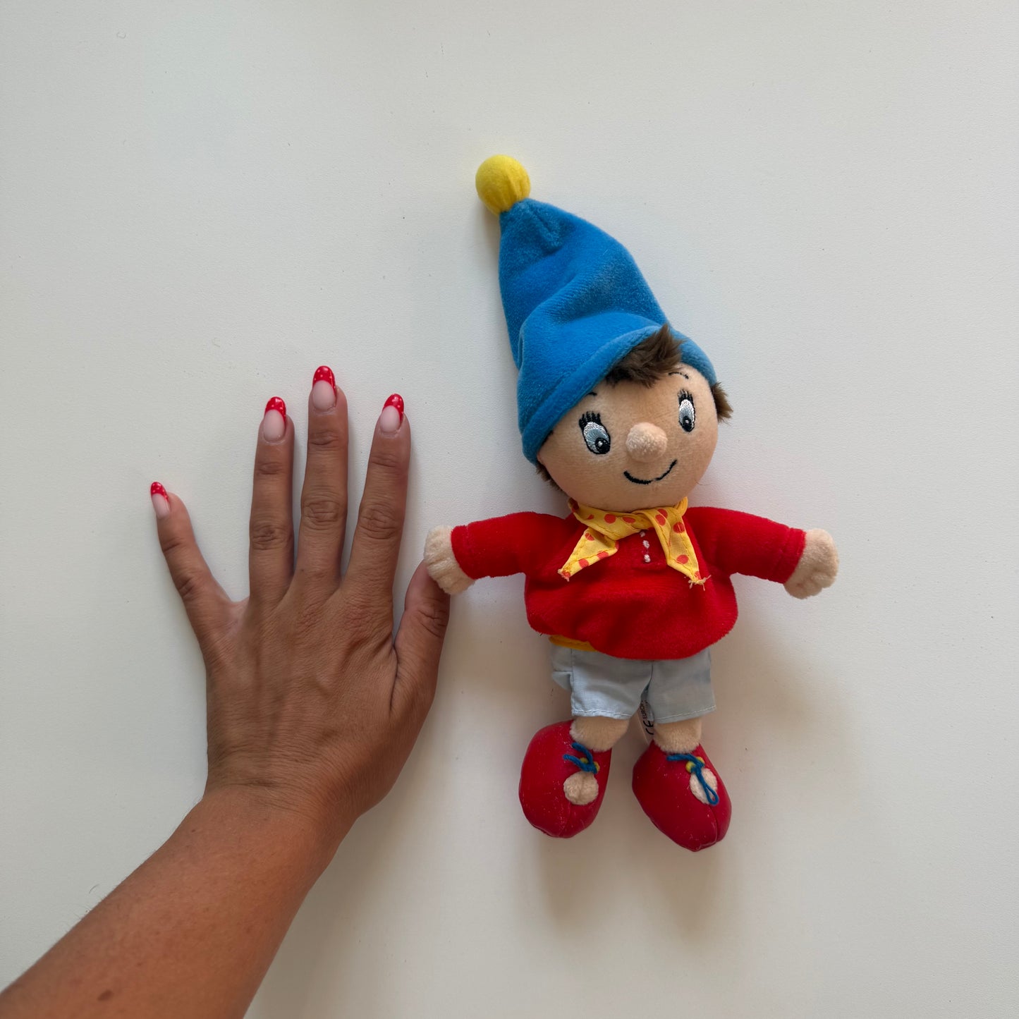 Vintage noddy plush doll with bell in the hat.