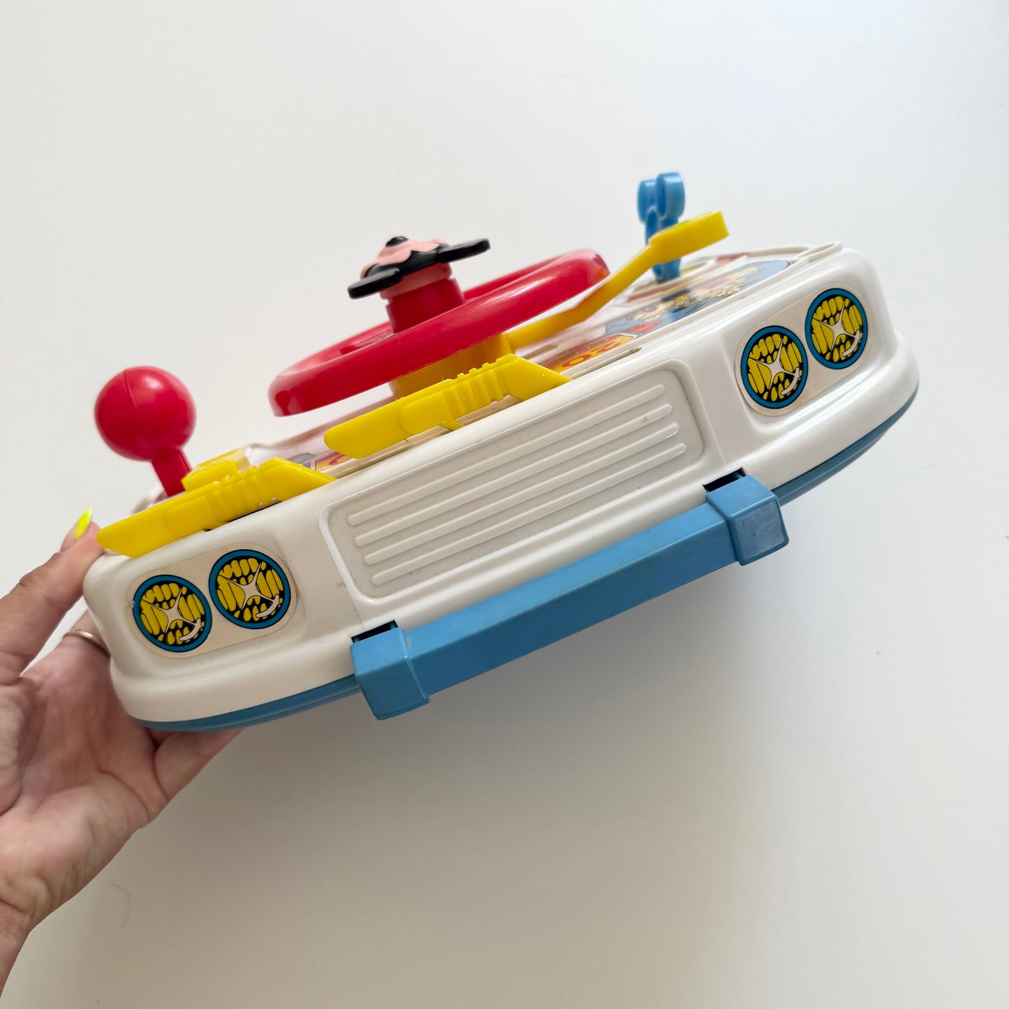 Vintage Disney carry around driver toy. Signs of wear.