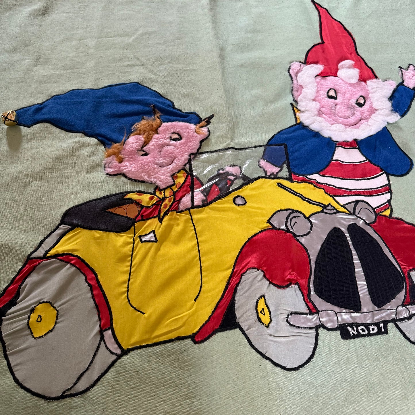 Handmade noddy wall hanging. Has little quirks. Condition as shown.