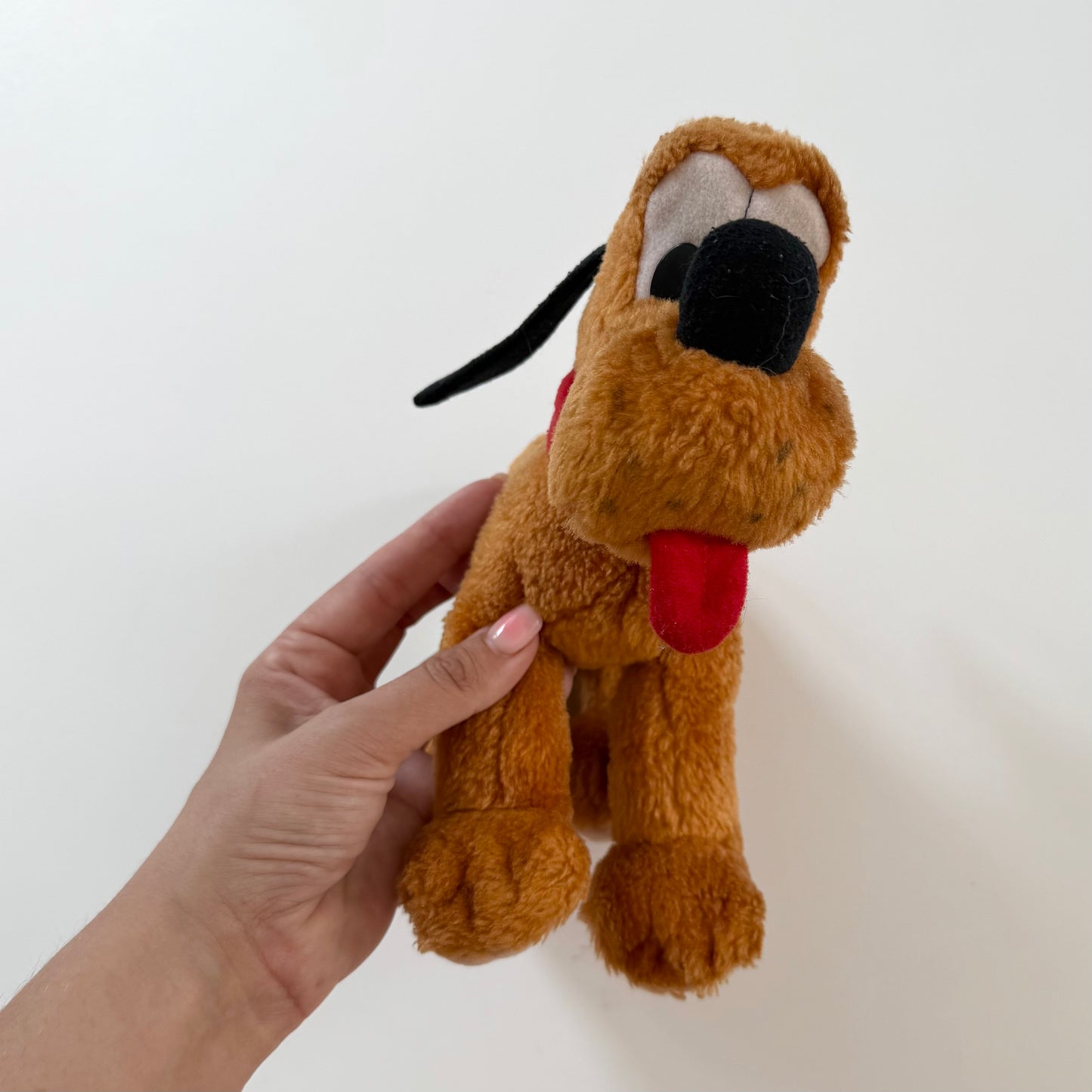 Vintage Pluto plush toy.