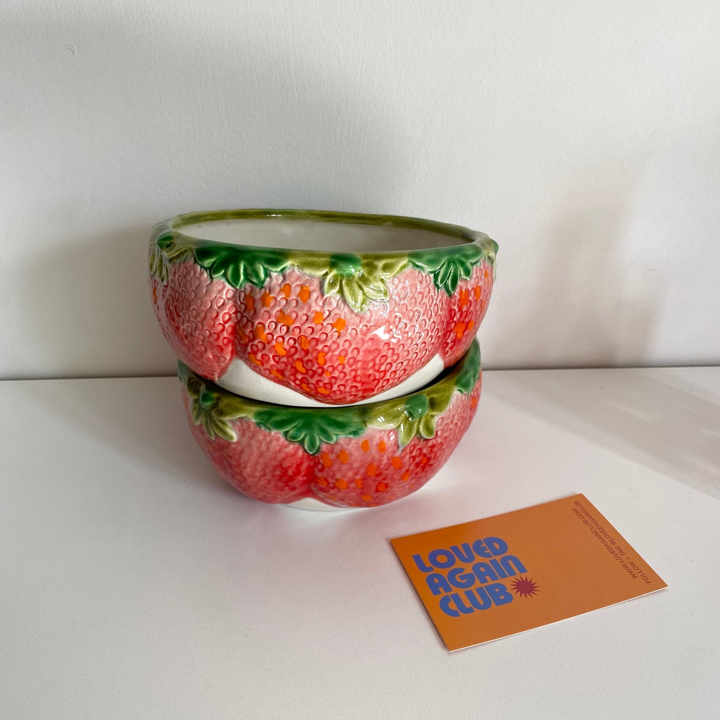 Set of two vintage ceramic strawberry fruit bowls.