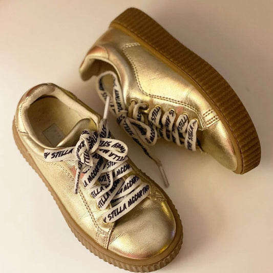 Stella McCartney gold trainers. Great condition size 29.