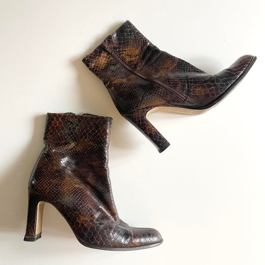 A classic pair of snake print genuine leather vintage ankle boots

Size 4.